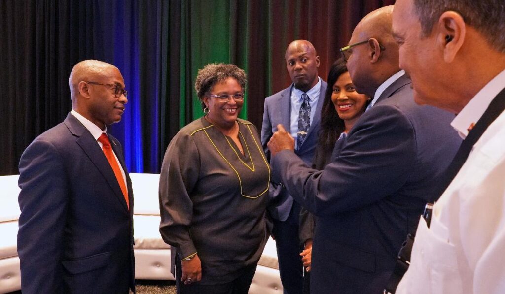 Prime Minister Mia Mottley chats with Jamaica’s Minister of Tourism Edmund Bartlett after her keynote presentation in Barbados last week. Looking on from left are Ian Gooding-Edghill, Minister of Tourism and International Transport, Barbados; Haydn Hughes, Minister of Tourism, Anguilla; Nicola Madden-Greig, President, CHTA; and Charles ‘Max’ Fernandez, Minister of Tourism, Antigua and Barbuda.